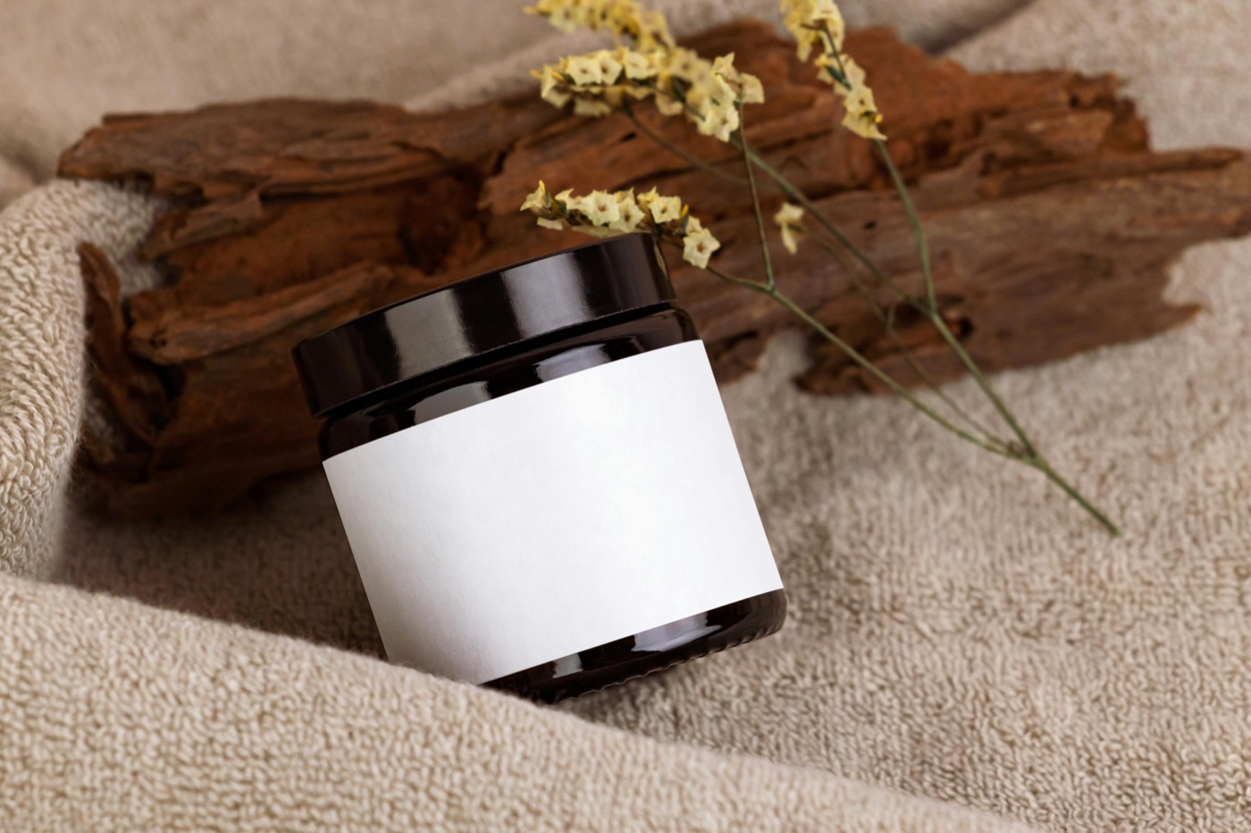 Two skincare bottles with INCI lists visible, highlighting ceramide ingredient declarations on the label