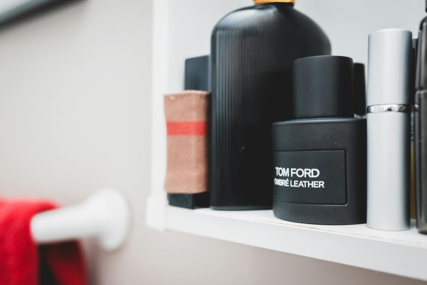 Bathroom counter arrangement with serums and skincare products organized neatly, representing a structured grooming routine